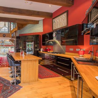 kitchen with wooden counter and flooring