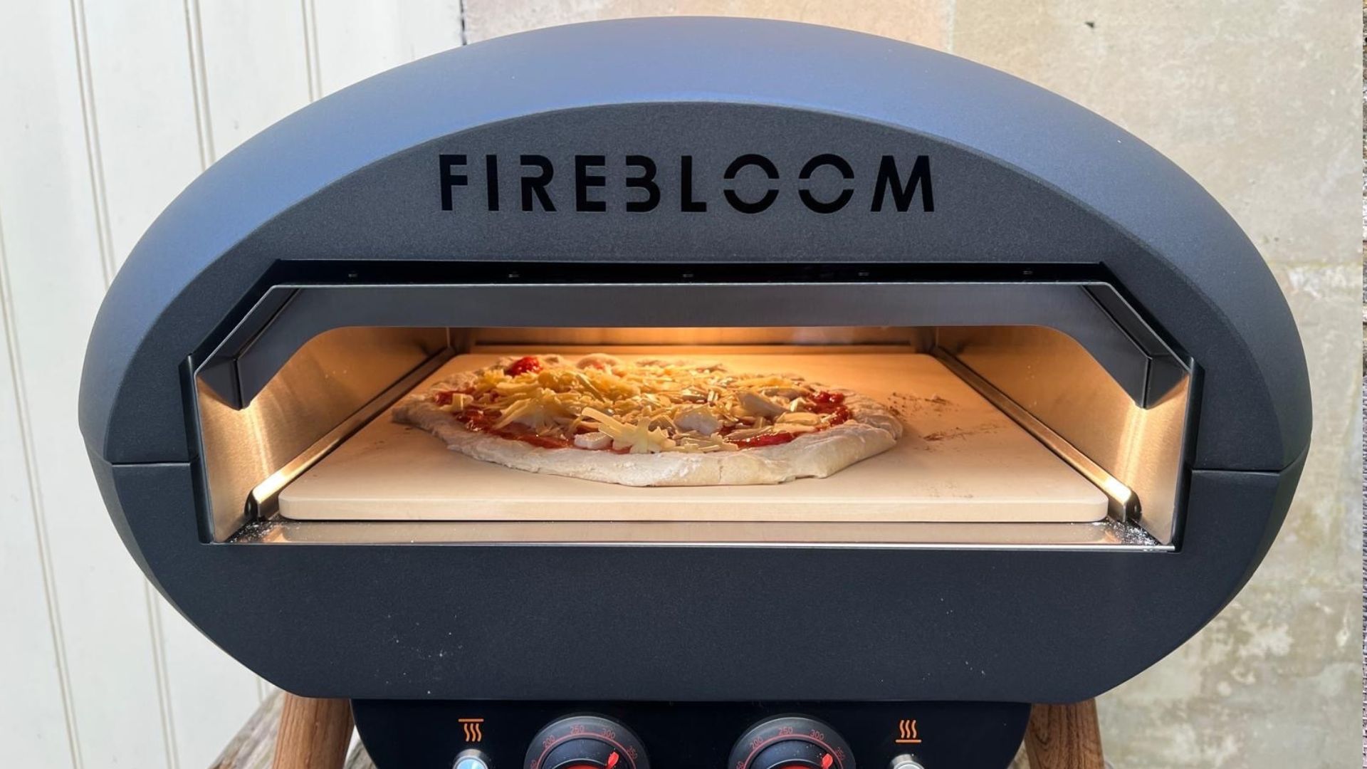The Firebloom EP03 Electric Pizza Oven being tested in a courtyard