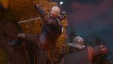 Geralt attacking a person in The Witcher 3 Remastered.