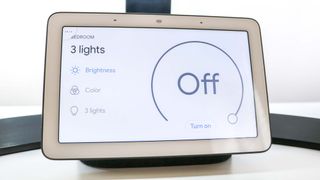 A Nest Hub Max controlling smart lights