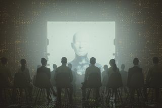 Cyborg/AI on a screen in front of a group of people sitting in chairs in a shadowy room
