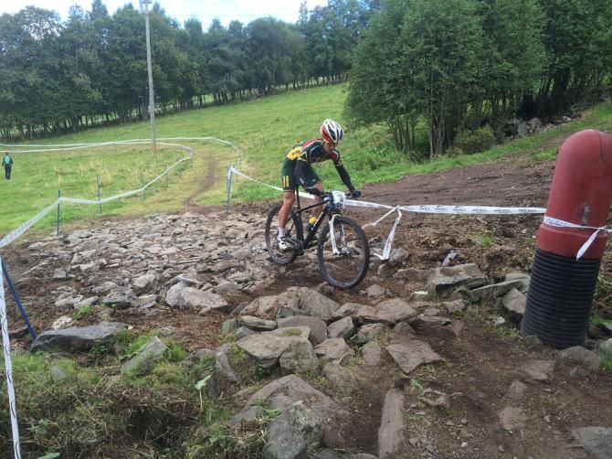 A South African rider goes through a rock garden