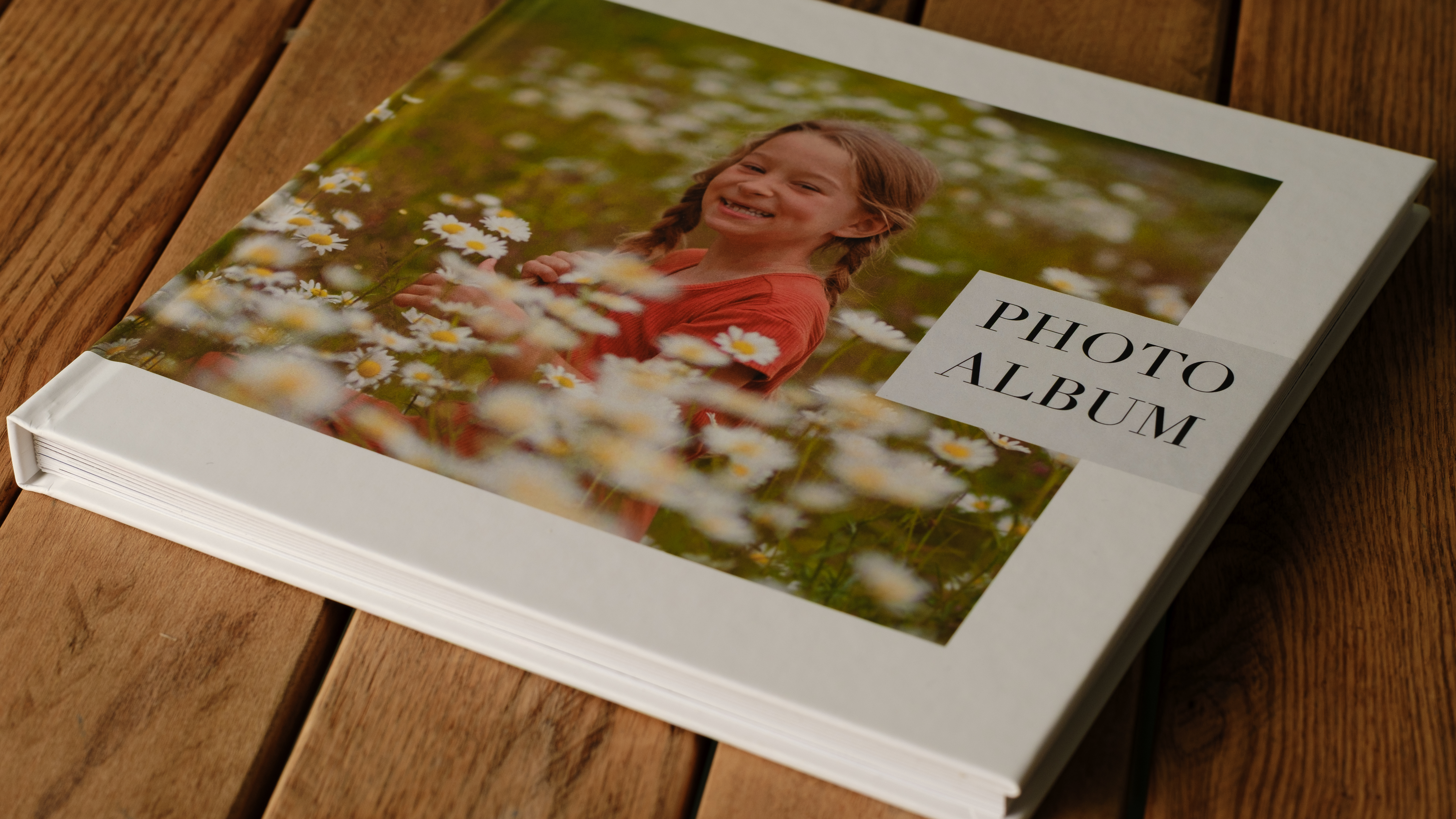 Mixbook photo books on a desk