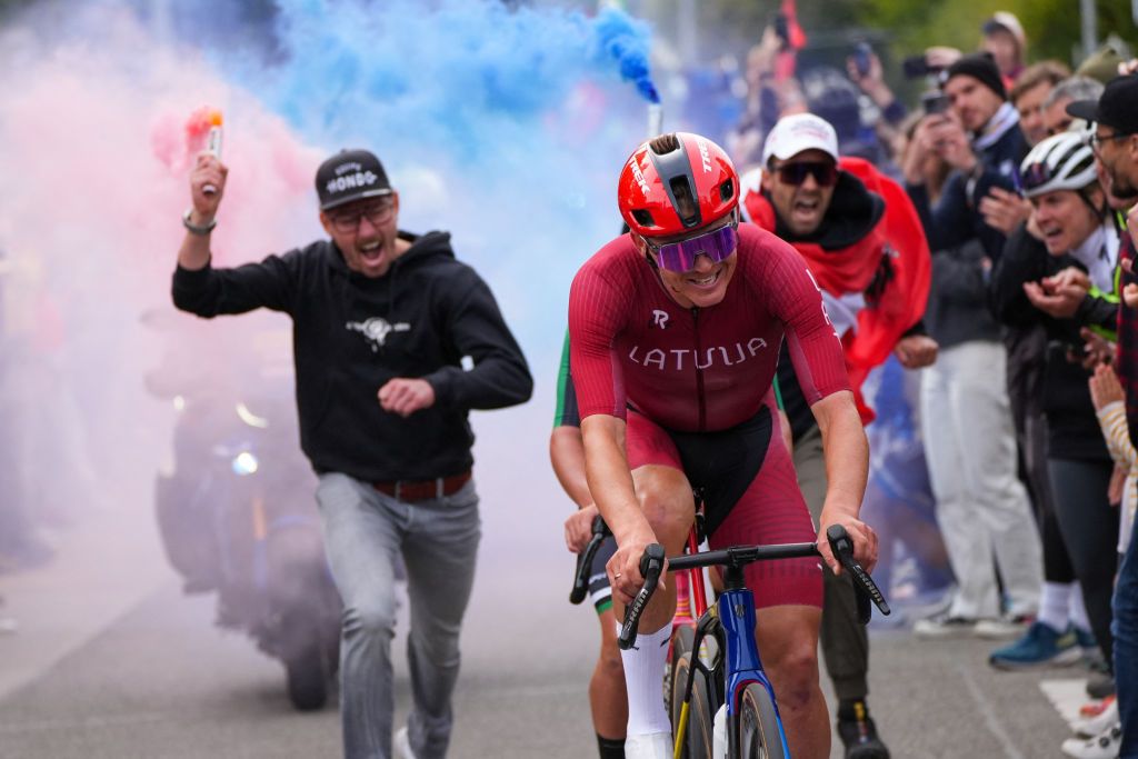 Latvia's Toms Skujins competes in the men's Elite Road Race cycling event during the UCI 2024 Road World Championships, in Zurich, on September 29, 2024. (Photo by Zac Williams / POOL / AFP) / -- IMAGE RESTRICTED TO EDITORIAL USE - STRICTLY NO COMMERCIAL USE --