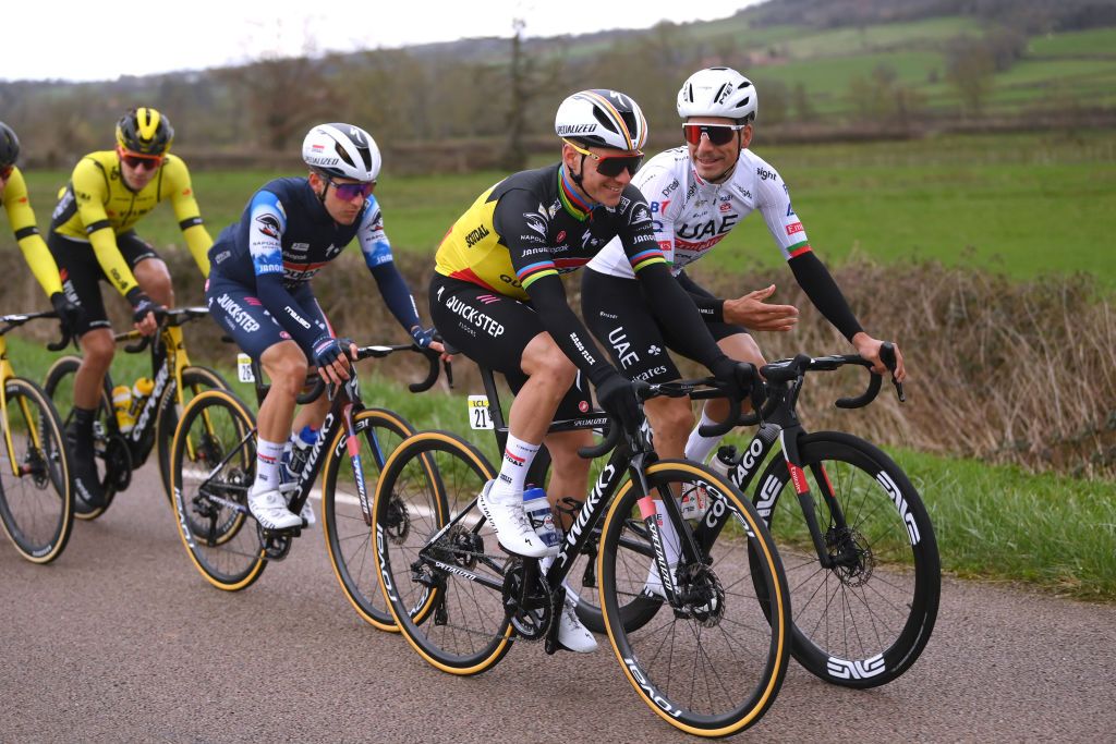 MONT BROUILLY FRANCE MARCH 06 LR Remco Evenepoel of Belgium and Team Soudal Quick Step and Joao Almeida of Portugal and UAE Team Emirates compete during the 82nd Paris Nice 2024 Stage 4 a 183km stage from ChalonsurSane to Mont Brouilly 476m UCIWT on March 06 2024 in Mont Brouilly France Photo by Alex BroadwayGetty Images