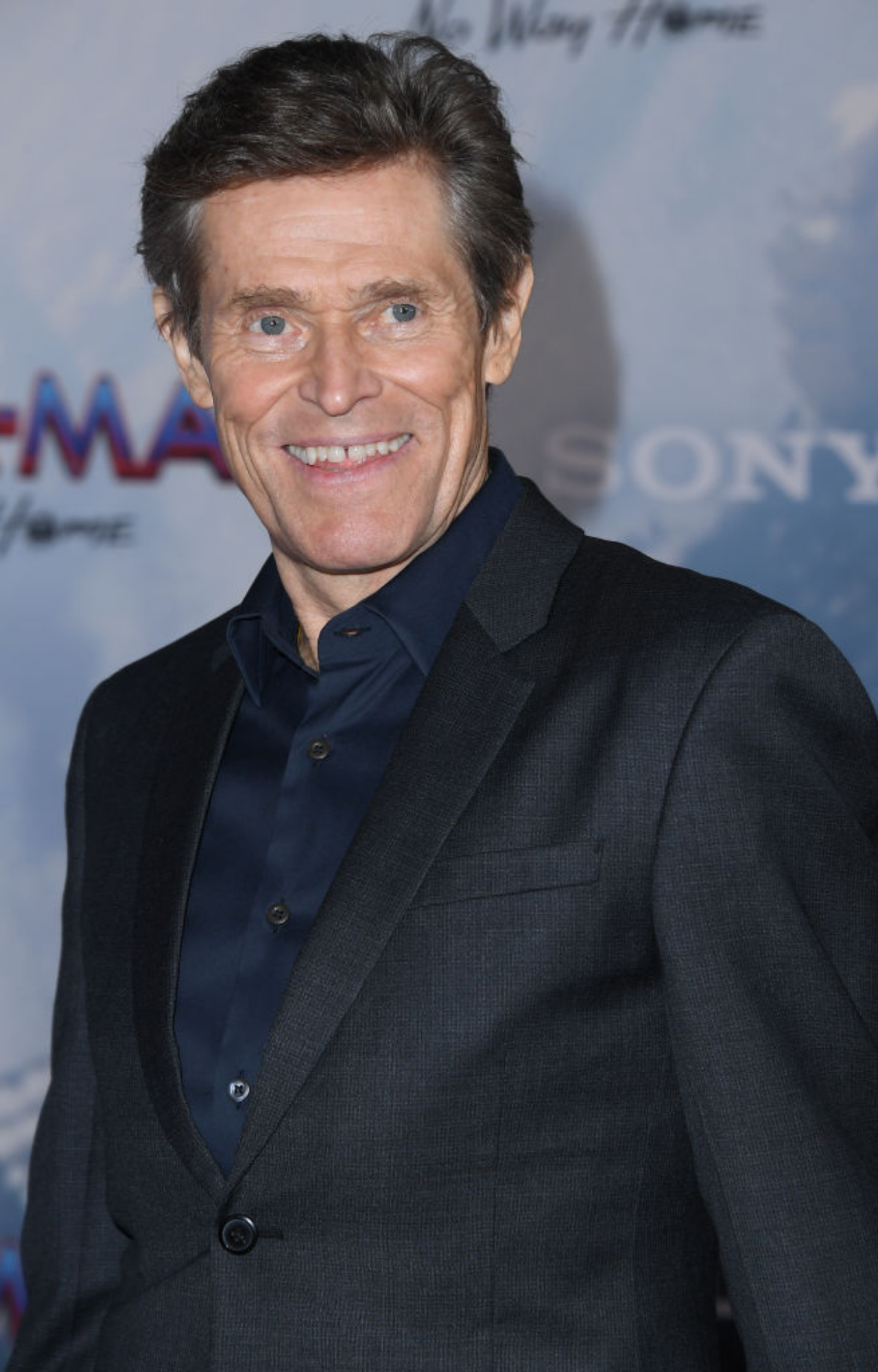 Willem Dafoe attends the premiere of Spider-man: No Way Home