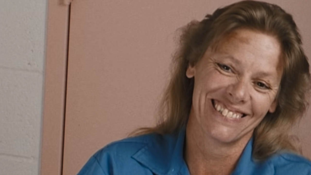 Aileen Wuornos smiling in an interview in Aileen: Queen of the Serial Killers