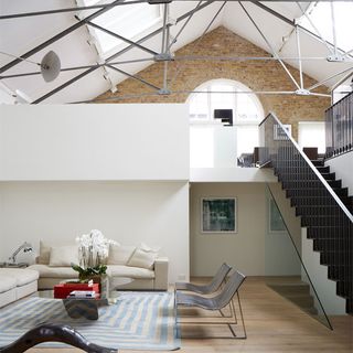 living room wooden flooring and white wall