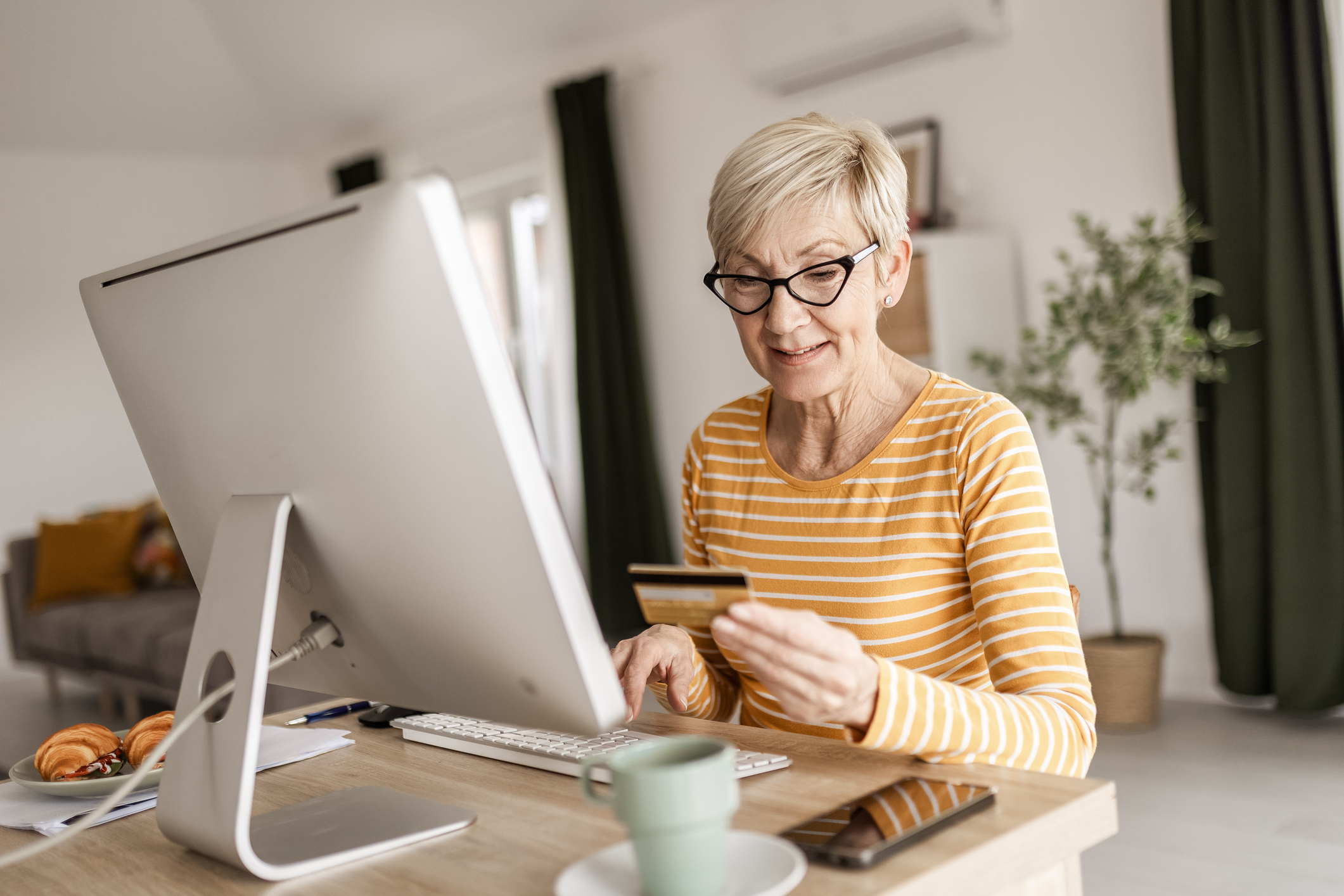 Woman Making an Online Purchase at Home