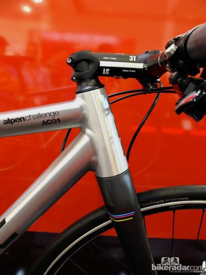 The oversized head tube and on this machine, a negative rise stem