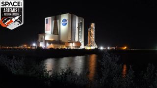 The Artemis-1 rocket is rolled out from the Vehicle Assembly Building en route to Launch Pad 39B shortly after midnight at the Kennedy Space Center in Florida on November 4, 2022. 