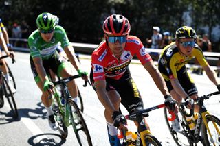 MOS SPAIN SEPTEMBER 04 Primoz Roglic of Slovenia and Team Jumbo Visma red leader jersey competes during the 76th Tour of Spain 2021 Stage 20 a 2022km km stage from Sanxenxo to Mos Alto Castro de Herville 502m lavuelta LaVuelta21 on September 04 2021 in Mos Spain Photo by Tim de WaeleGetty Images