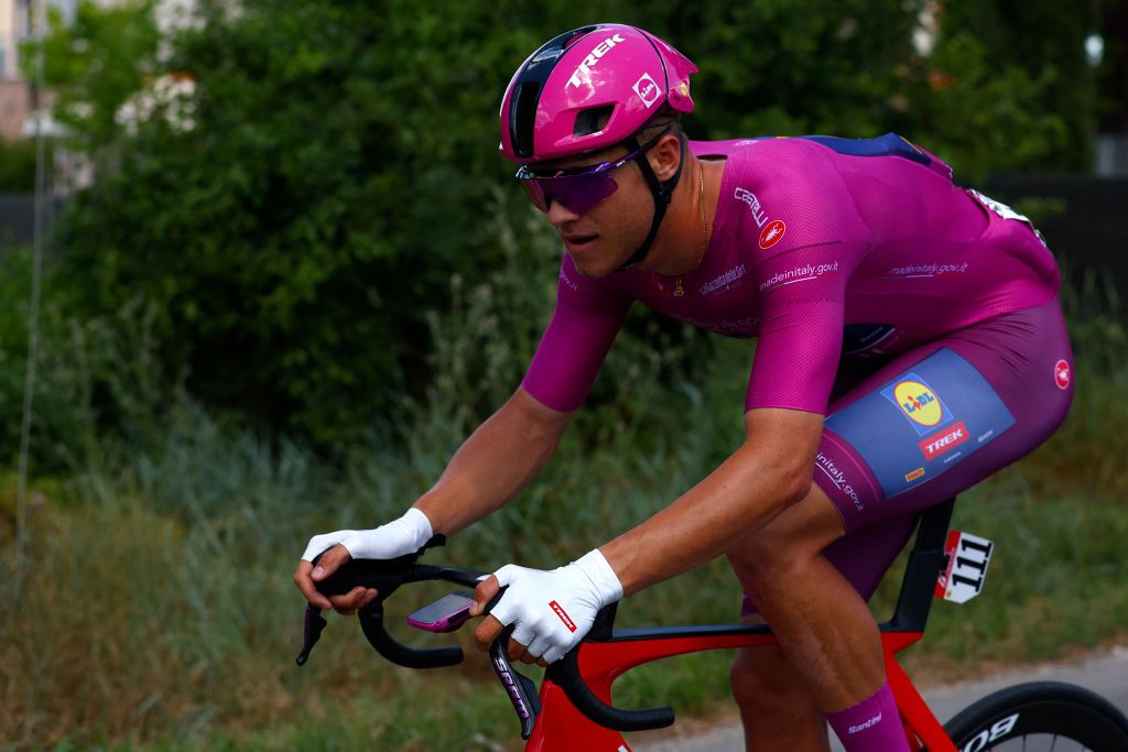 The best sprinter's cyclamen jersey Team Lidl-Trek's Italian rider Jonathan Milan rides during the 13th stage of the 107th Giro d'Italia cycling race, 179km between Riccione and Cento, on May 17, 2024. (Photo by Luca Bettini / AFP)