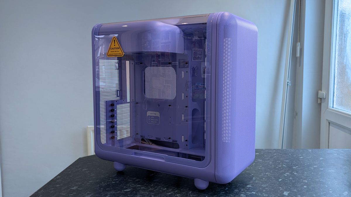 HYTE X50 Taro Milk PC case on a marble desk top, highlighting key features