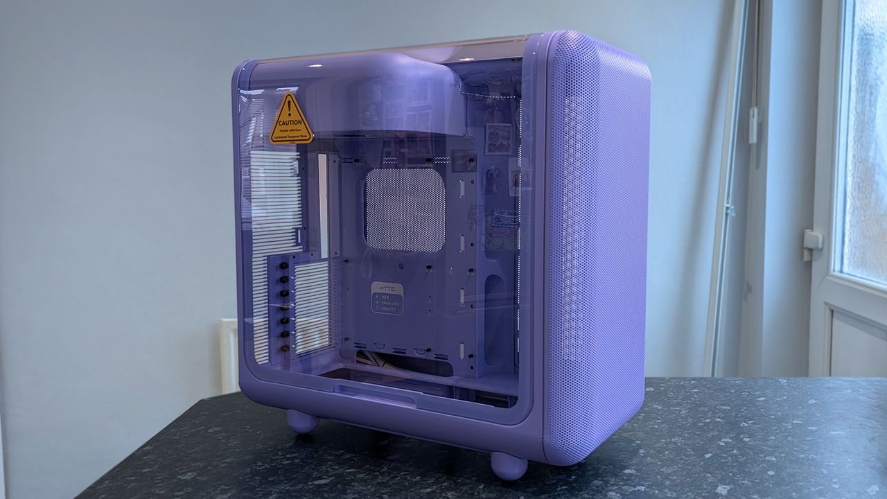 HYTE X50 Taro Milk PC case on a marble desk top, highlighting key features