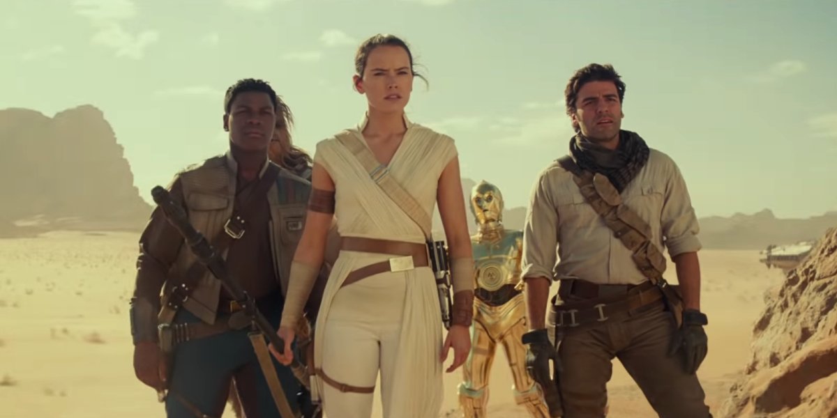 Star Wars: The Rise of Skywalker Finn, Rey, C-3Po, and Poe stand on a ridge in the desert