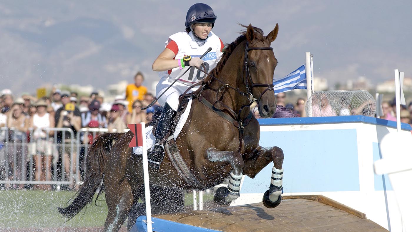BT Sport. Olympic Games, Athens, Greece. 17th August 2004. Equestrian. Three Day Eventing, Cross Country. The Water Jump. Jeanette Brakewell of Great Britain riding "Over to You".