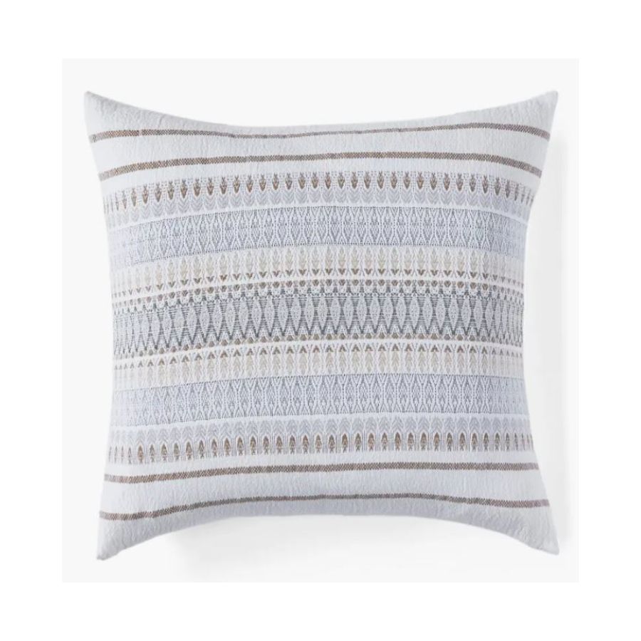 throw pillow with light blue geometric pattern