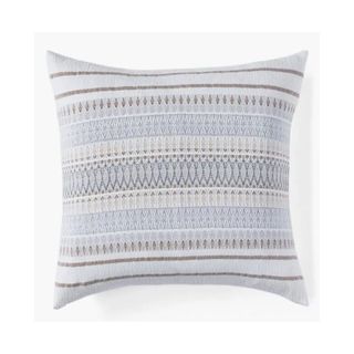 throw pillow with light blue geometric pattern
