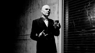 Billy Corgan holding an Erewhon smoothie
