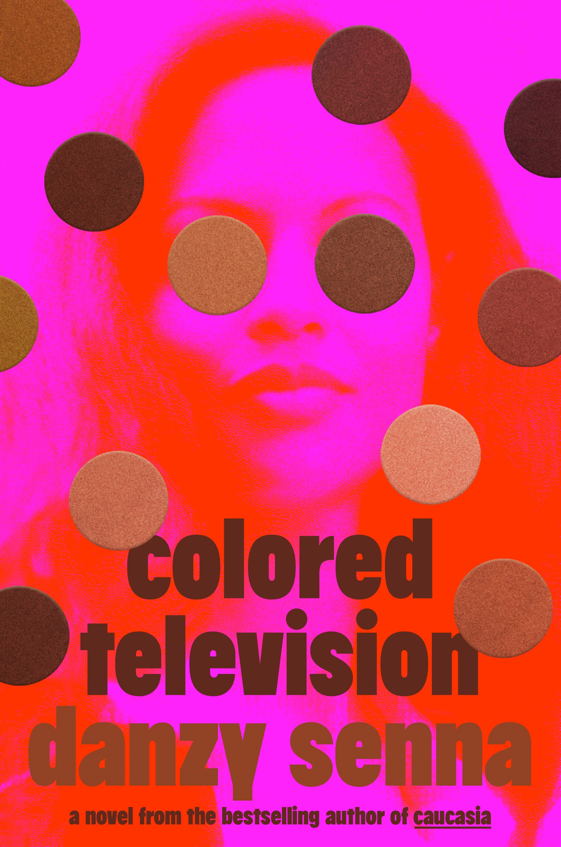 the cover of the book colored television featuring a woman's face outline in pink and orange with gold dots over it