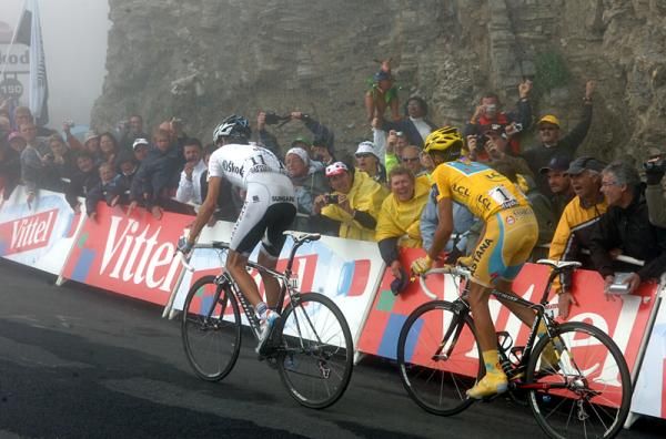 Andy Schleck (Saxo Bank) and his yellow shadow approach the line on the Tourmalet.