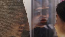 Girl looking at Rosetta Stone 