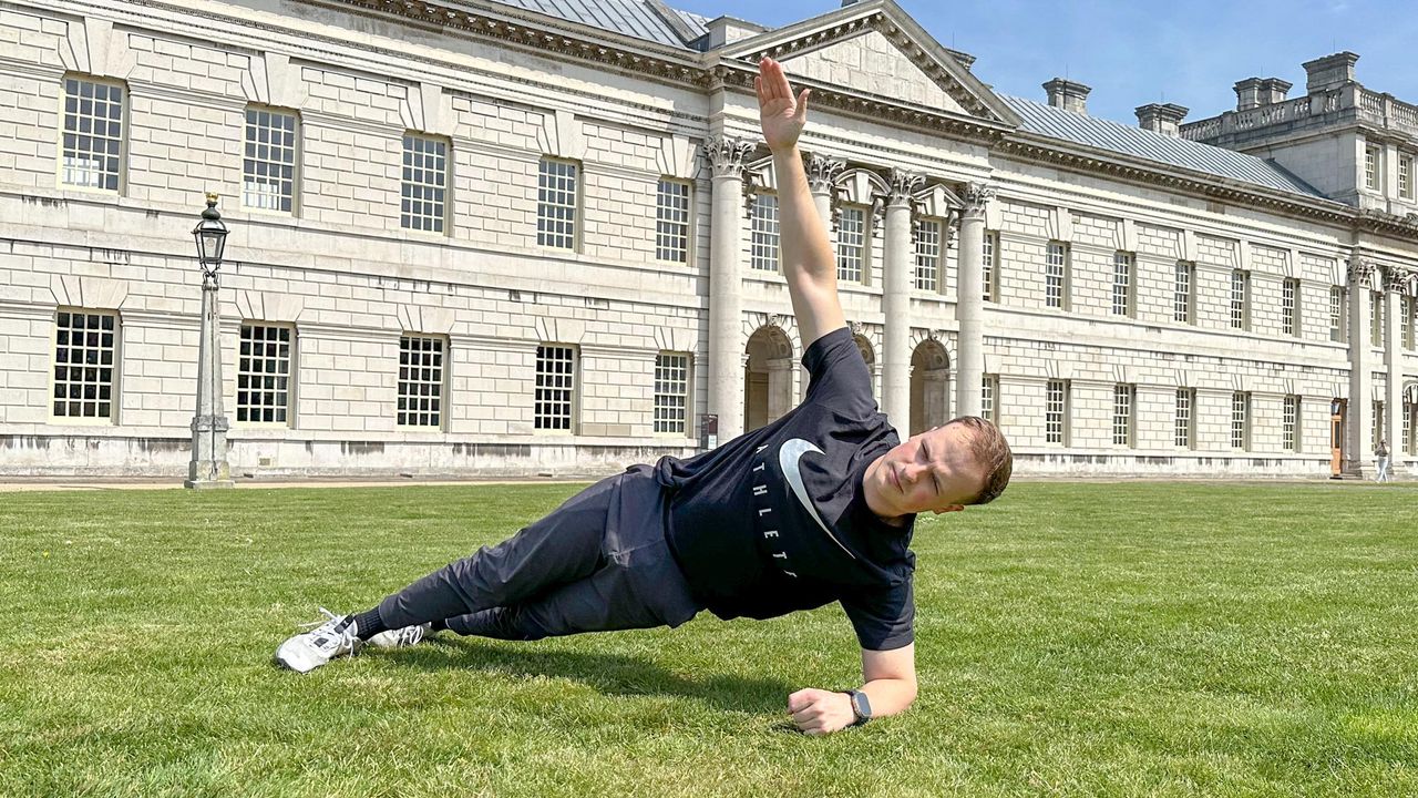 Ollie Thompson holding a side plank