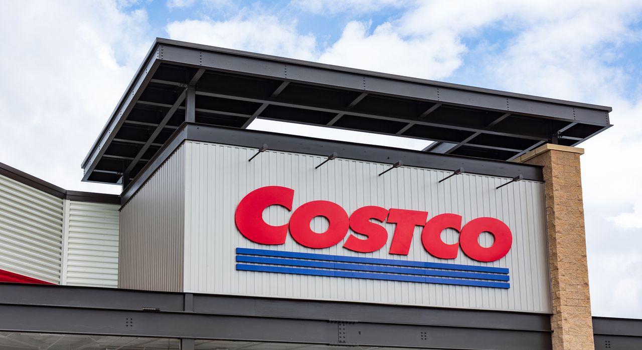 Mooresville, NC, USA-June 19, 2019: The COSTCO logo on the front exterior of a local store..