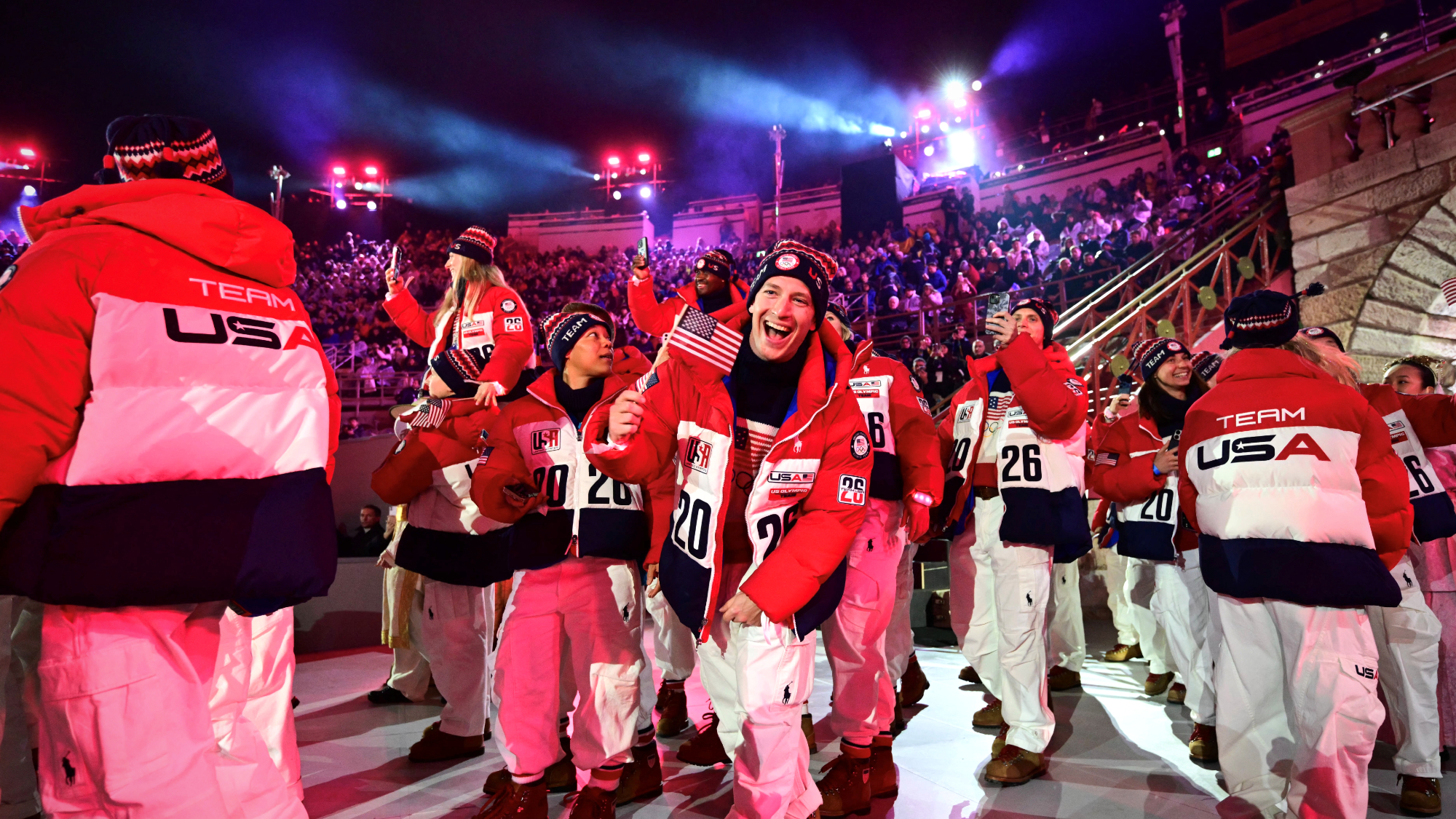 USA's Hunter Wonders parades with members of his delegation during the closing ceremony of the Milano Cortina 2026 Winter Olympic Games at the Verona Arena 