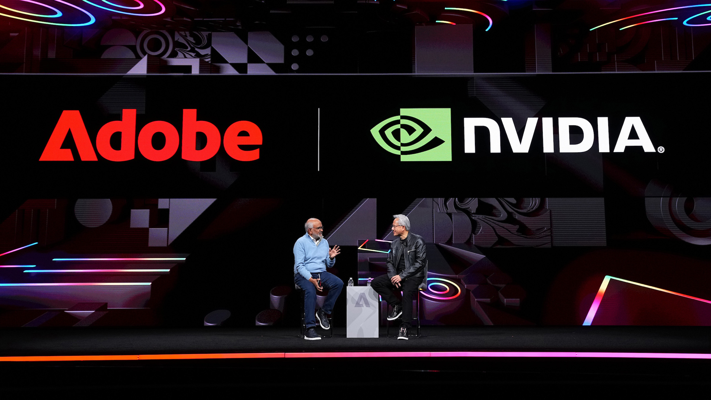 Shantanu Narayen and Jensen Huang speaking at Adobe Summit 2026