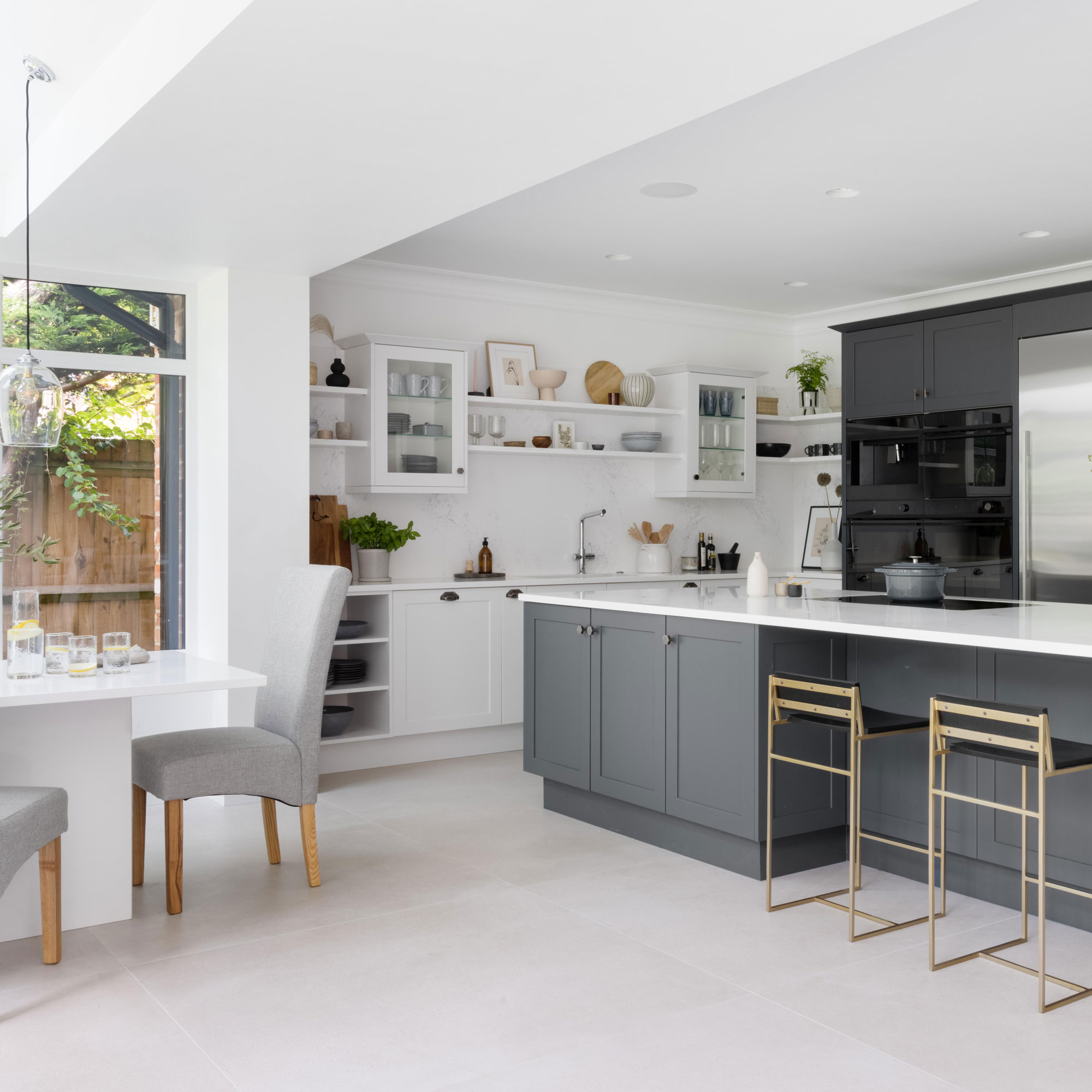 grey and white open plan kitchen diner