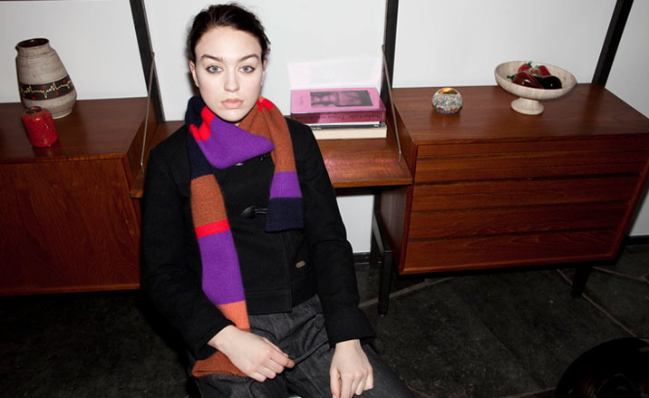 Woman wearing stripy scarf