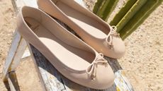 Tan ballet pumps from Sam Edelman with gravel background