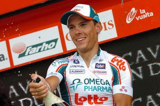 Stage winner Philippe Gilbert uncorks the bubbly for the second time in the 2010 Vuelta.