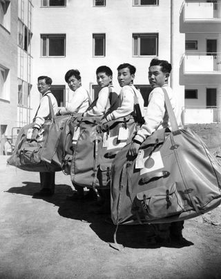 olympic athletes with bags