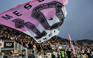 Inter Miami fans wave a huge flag at Lionel Messi's official presentation in July 2023.