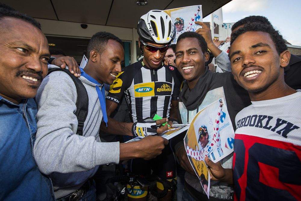 MTN-Qhubeka's Daniel Teklehaimanot signs autographs during 'Daags na de Tour,' in Boxmeer, the Netherlands, on July 27.