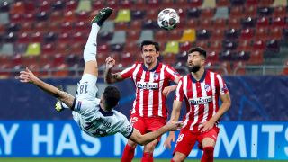 Olivier Giroud scoring against Atletico Madrid