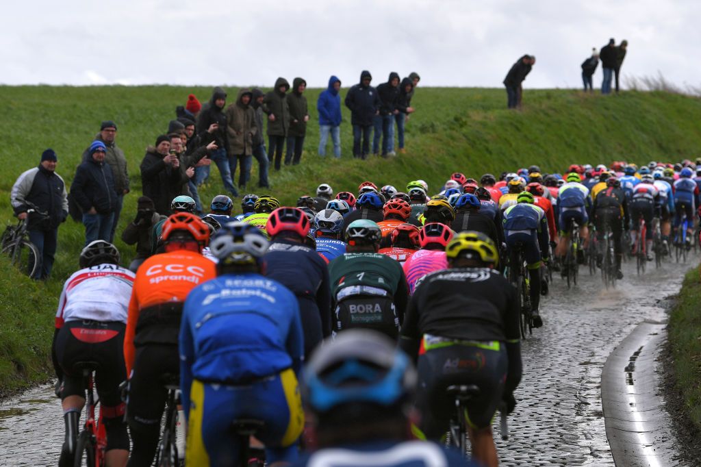 NINOVE BELGIUM FEBRUARY 29 Holleweg Cobblestones Peloton Fans Public Helicopter Landscape during the 75th Omloop Het Nieuwsblad 2020 Men Race a 200km race from Ghent to Ninove OmloopHNB OHN20 on February 29 2020 in Ninove Belgium Photo by Tim de WaeleGetty Images