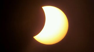 The partial eclipse was easily visible over Nashville before clouds rolled in to obstruct the total solar eclipse.