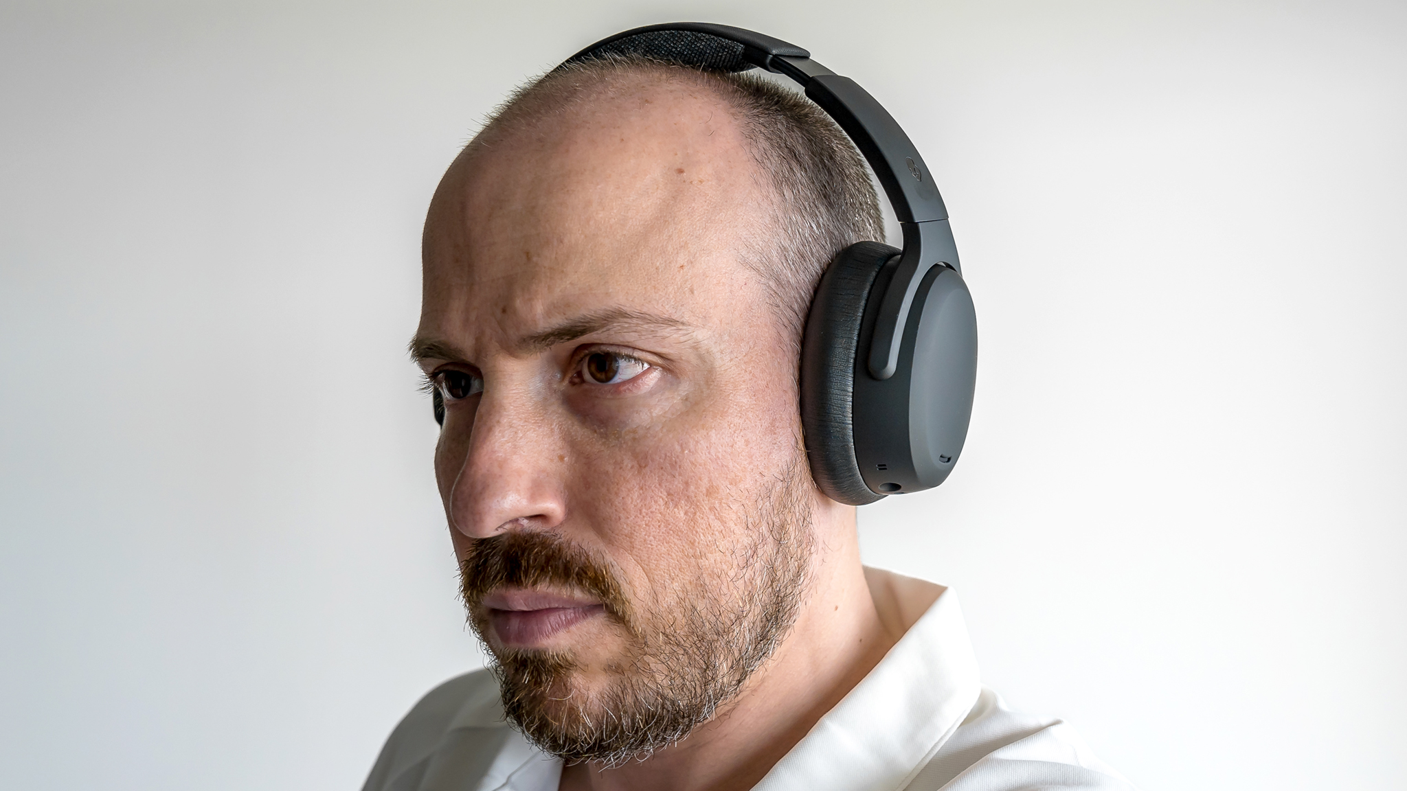 Wearing the Skullcandy Crusher ANC 2 over-ear headphones.