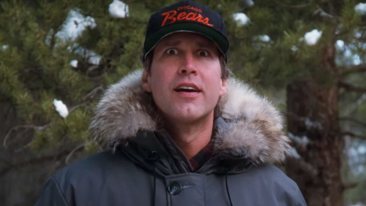 Chevy Chase looking a tree in National Lampoon's Christmas Vacation