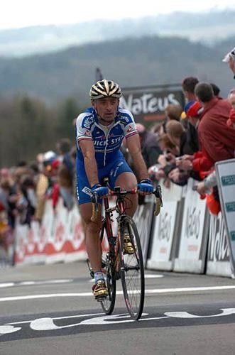 Paolo Bettini (Quick.Step) rolls across for 12th