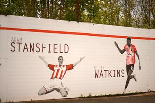 Detailed view of a mural inside of the stadium shown Former Exeter City Footballers Ollie Watkins and Adam Stansfield during the Sky Bet League Two match between Exeter City and Grimsby Town at St James Park on April 27, 2021 in Exeter, England. Sporting stadiums around the UK remain under strict restrictions due to the Coronavirus Pandemic as Government social distancing laws prohibit fans inside venues resulting in games being played behind closed doors.
