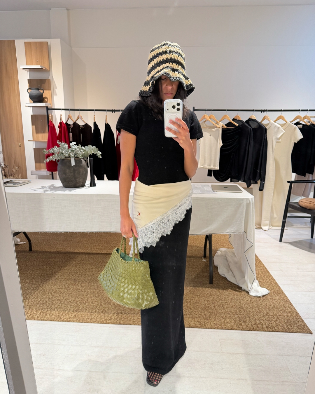 Cathy Karuga wearing a summer hat.