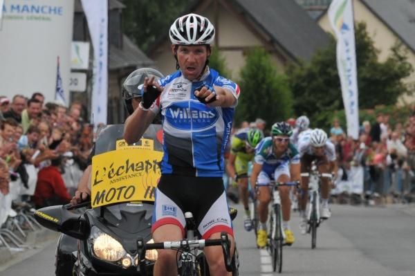Andy Cappelle does his best impersonation of 'blue steel' on a bike.