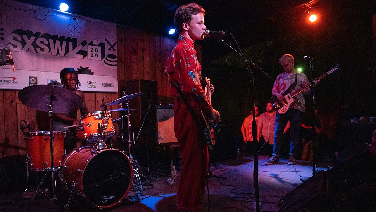 Drummer Morgan Simpson (L), singer and guitarist Geordie Greep and bassist Cameron Picton of Black Midi perform live on stage during the 2019 SXSW Conference and Festival at Barracuda Backyard on March 13, 2019 in Austin, Texas. 