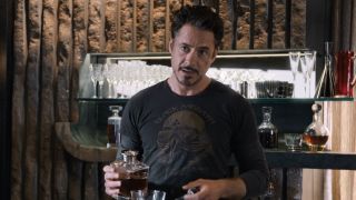 Tony drinking and threatening Loki in The Avengers