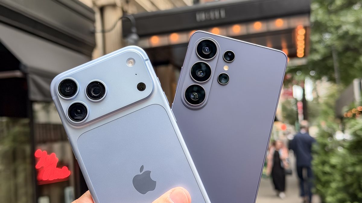 The iPhone 18 Pro Max and Galaxy S26 Ultra in hand with a close-up look at their cameras